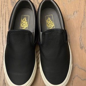 Classic Black leather old Skool Vans. Brand New. Never worn. Aritzia collab